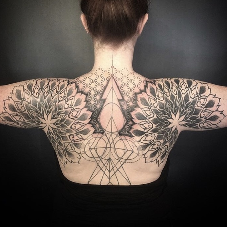 geometric back tattoo